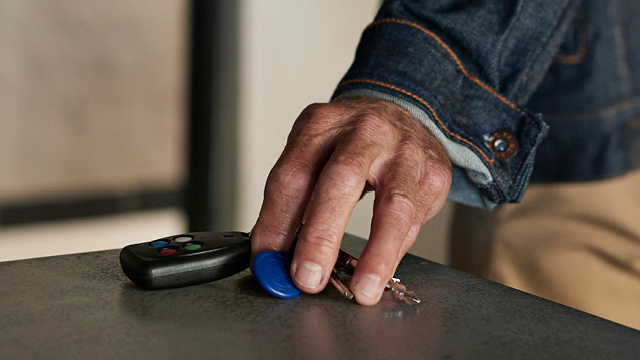 A hand holding keys